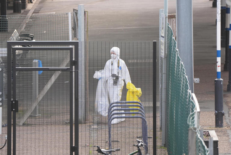 Forensic investigators at Huntingdon train station in Cambridgeshire (Joe Giddens/PA) (PA Wire)